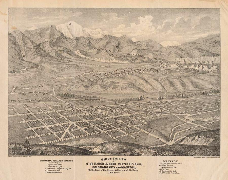 Black-and-white pencil drawing of a city and surrounding mountains.