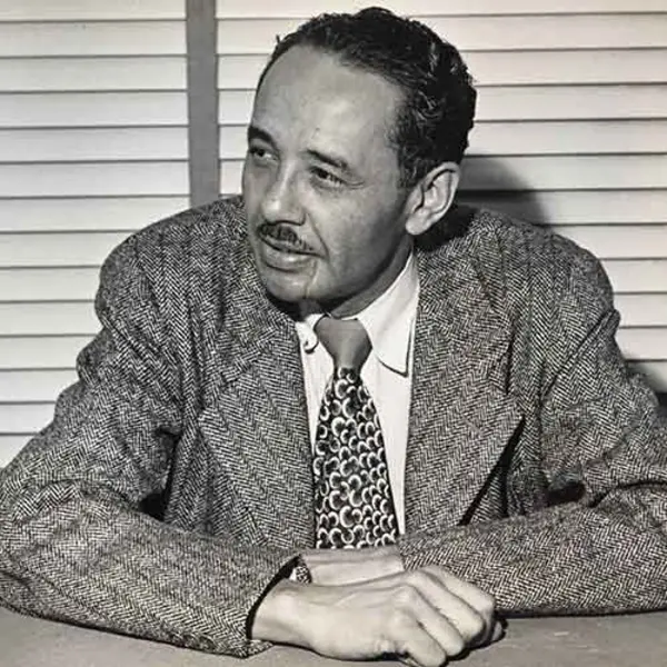 Loren Miller, seated at desk, ca. 1950. Unknown photographer. Loren Miller Collection. The Huntington Library, Art Museum, and Botanical Gardens.