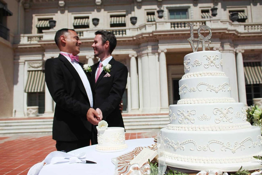 Wedding couple cutting cake