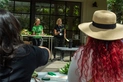 The Flowers Duet (sisters) giving lessons on flower arranging.