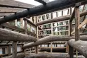 The original roof beams were used in the reconstructed framework of the house. 