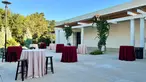 High tables with tableclothes.	