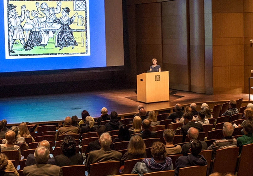 attendees at a lecture in a hall