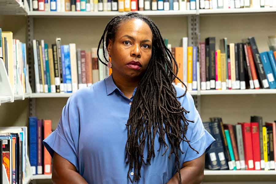 Dana Johnson, writer and associate professor of English at the University of Southern California, in the Library at The Huntington. Photo by Kate Lain.