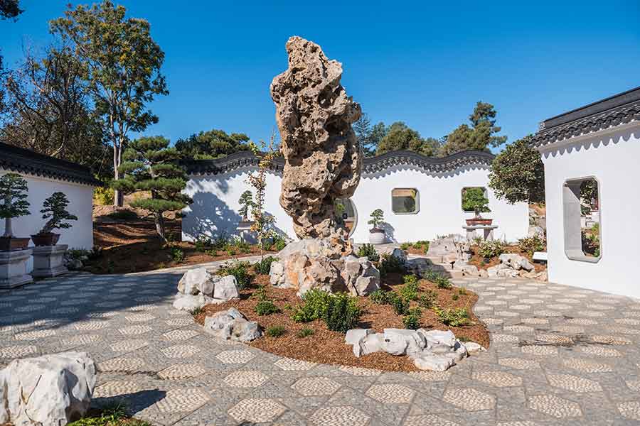 The Cloudy Forest Court 雲林院, one of the architectural features within the Verdant Microcosm 翠玲瓏, the Chinese Garden’s new penjing complex. Penjing are displayed amid distinctive scholar’s rocks, making for dramatic viewing. Photo by Jamie Pham.