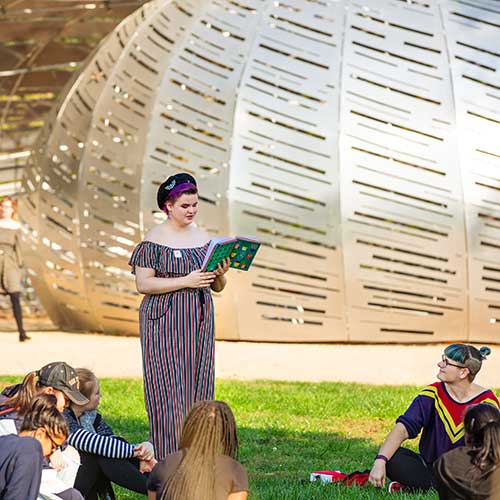 WriteGirl pop-up poetry reading in front of the Orbit Pavillion